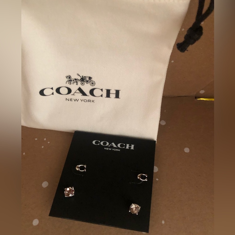 Coach brand stud earrings set.